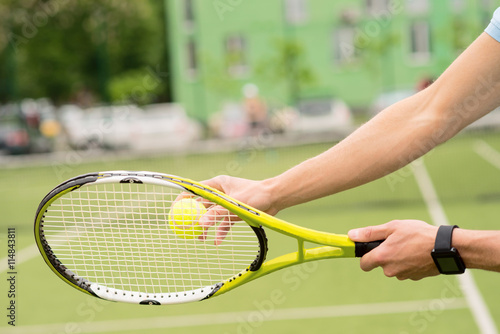 Skillful male tennis player ready for competition