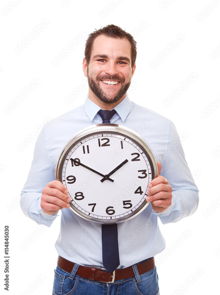 Smiling man holding a clock
