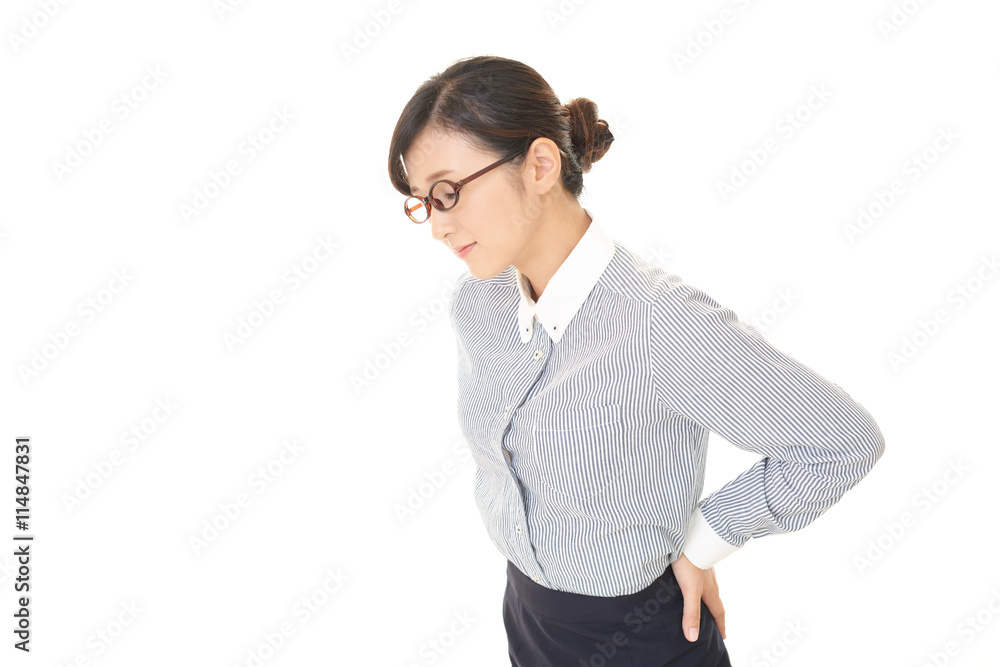 腰痛に悩む女性 腰痛に悩む女性
