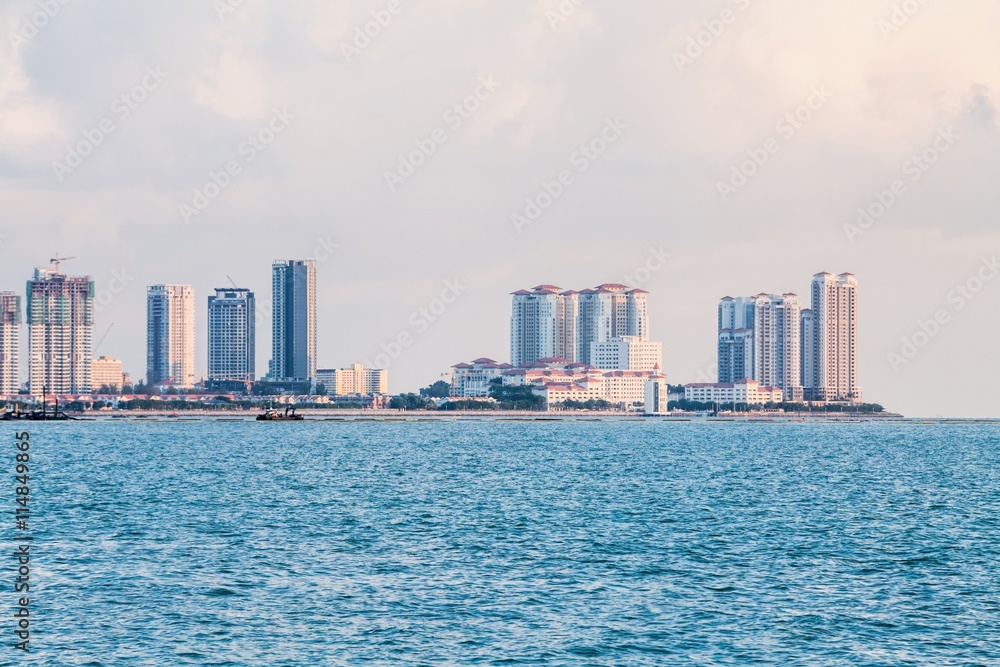 Tanjung Bungah high rise building view with mountain and sea, Penang Malaysia Tanjung Bungah high rise building view with mountain and sea, Penang Malaysia