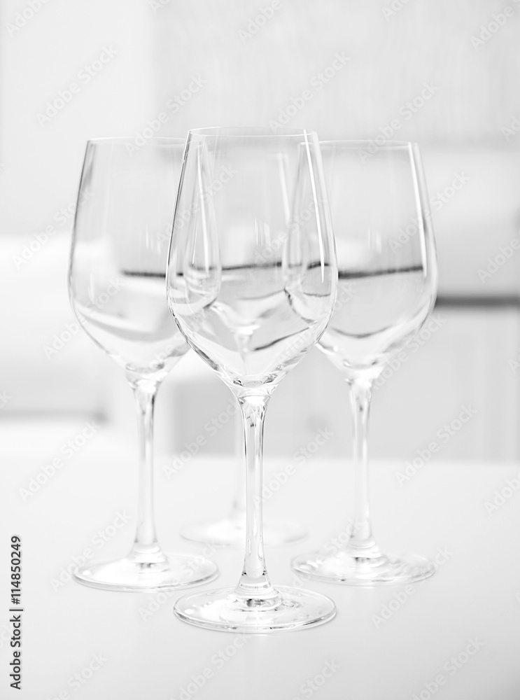 Wineglasses on blurred interior background Wineglasses on blurred interior background