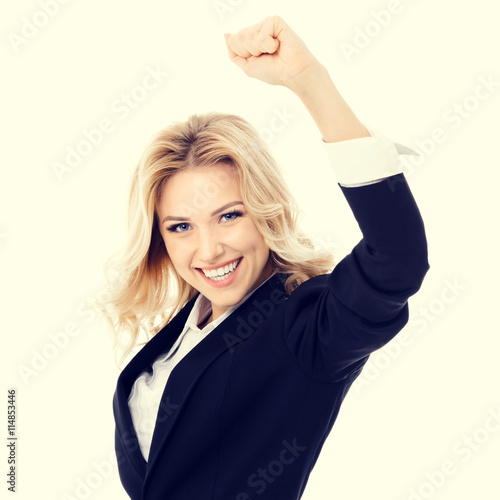 Happy gesturing young cheerful businesswoman
