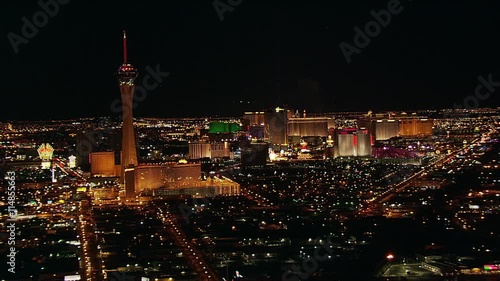 Wide aerial view of Las Vegas at night, looking toward Stratosphere. Shot in 2005.