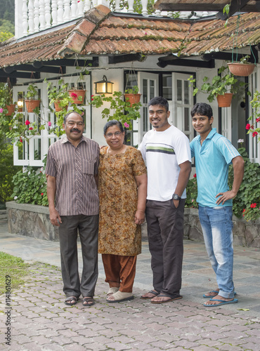 Photography Family/A photo of the owner of a small but cozy hotel and his family
