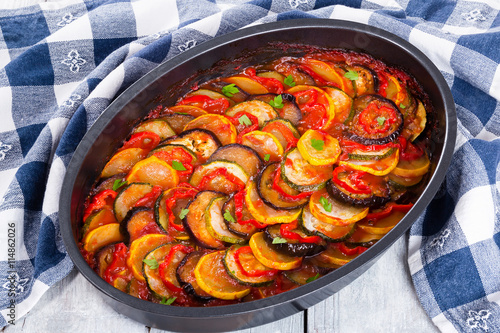 Layered ratatouille in a baking dish, close-up