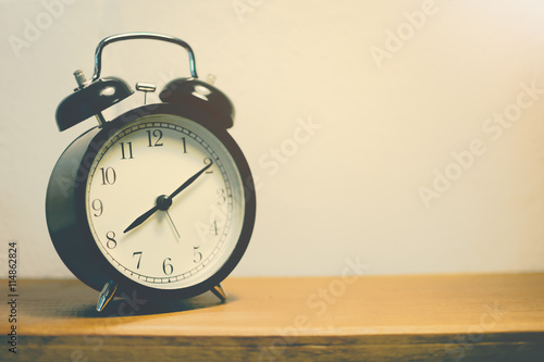 Retro alarm clock on table