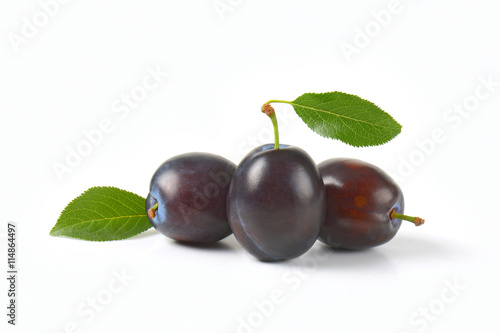 three ripe plums