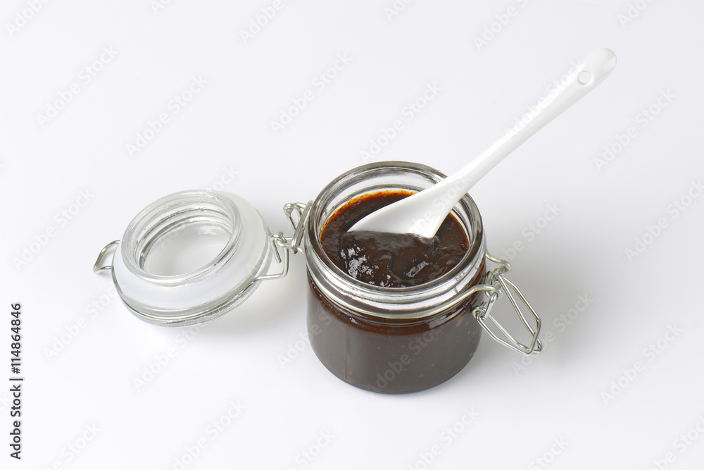 jar of thick plum jam jar of thick plum jam
