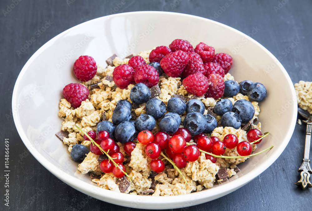 Bowl of healthy muesli with fresh berries Bowl of healthy muesli with fresh berries
