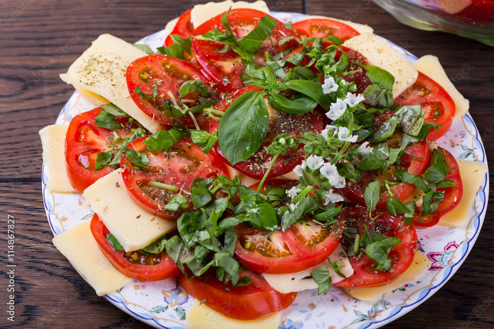 Vegetarian salad with cheese and tomatoes Vegetarian salad with cheese and tomatoes