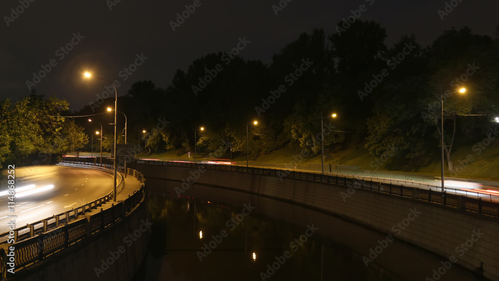 embankment,  reflection in water , motion night scene