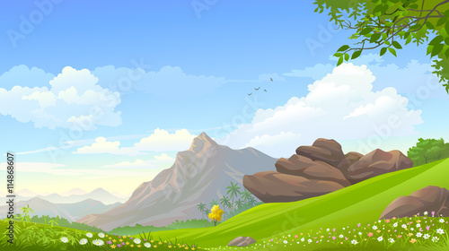 An august mountain touching the blue skies and overlooking vast serene green fields