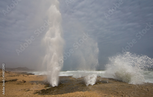 Blowholes on the beach of Mughsayl (Mughsail) in Salalah, Oman