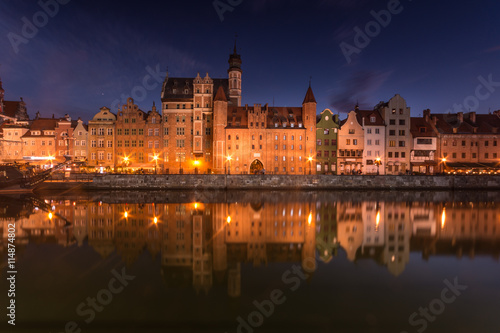 Medieval waterfront reflecting in river, Gdansk, Poland