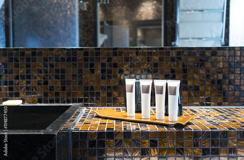 Hotel bathroom set. Lotion, shampoo, soap, conditioner