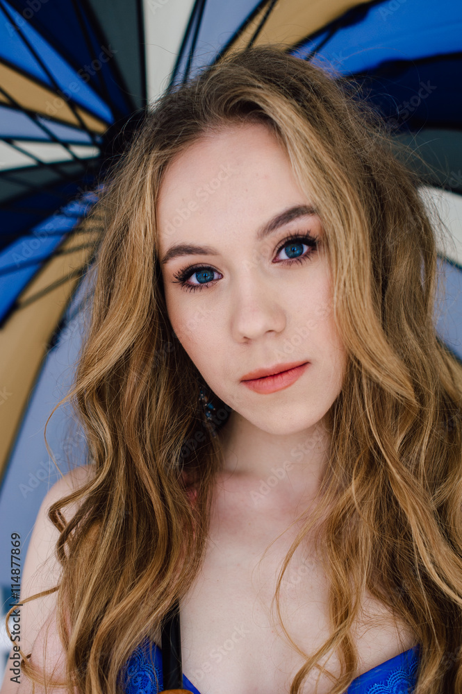 Beautiful sexy lady in elegant blue panties and bra. Fashion portrait