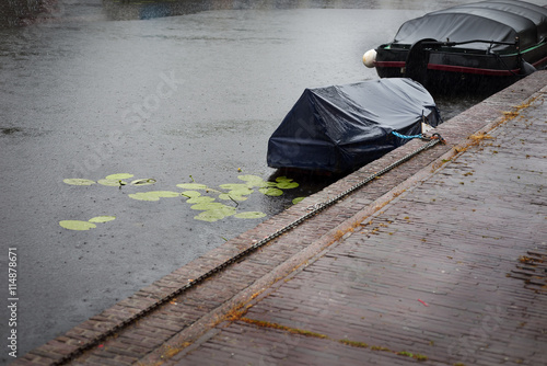 Photography Waterlily and boats in Amsterdams canal