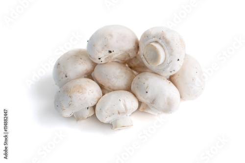 White champignon mushrooms isolated on white background