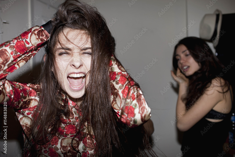 Young woman dancing at a party Young woman dancing at a party