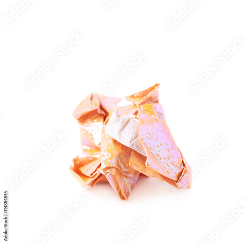 Crumbled ball of colorful paper isolated