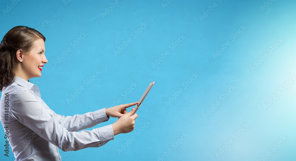Woman use tablet device . Mixed media Woman use tablet device . Mixed media