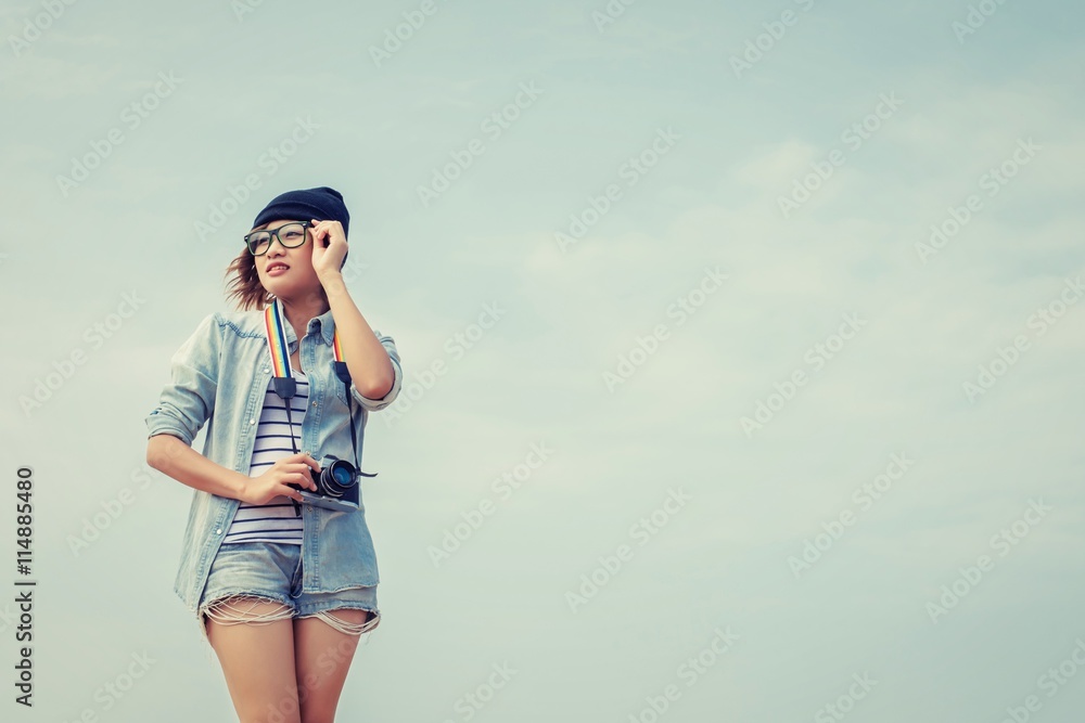 Beautiful Woman wear glasses with retro camera Beautiful Woman wear glasses with retro camera