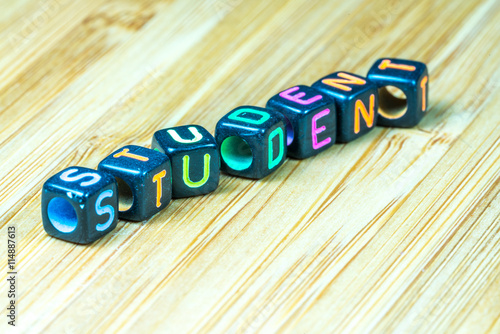 Colorful letter cube with bamboo texture surface. Educational co photo