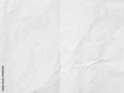 Crumpled white paper background photo
