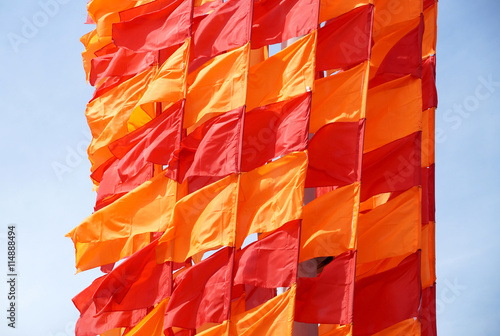 Festive flags of red and orange color
