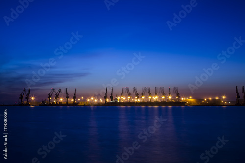 Freight dock of container crane at night © zhengzaishanchu