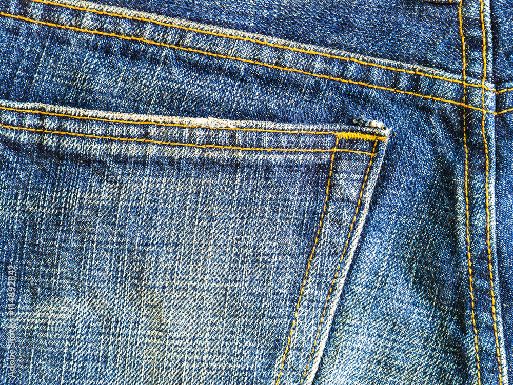 Close up of back pocket ,texture blue of jeans Close up of back pocket ,texture blue of jeans