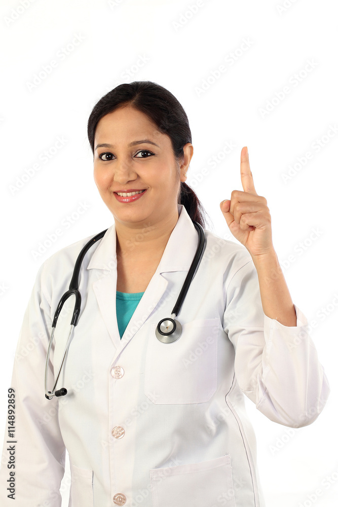 Young doctor woman presenting and showing copy space Young doctor woman presenting and showing copy space