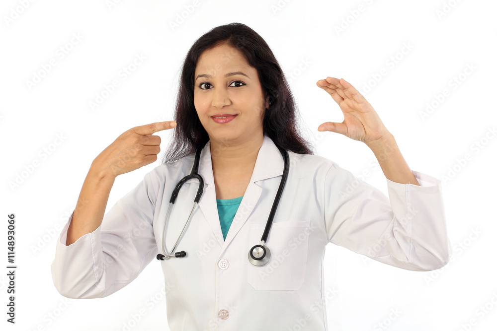 Young doctor woman presenting and showing copy space Young doctor woman presenting and showing copy space