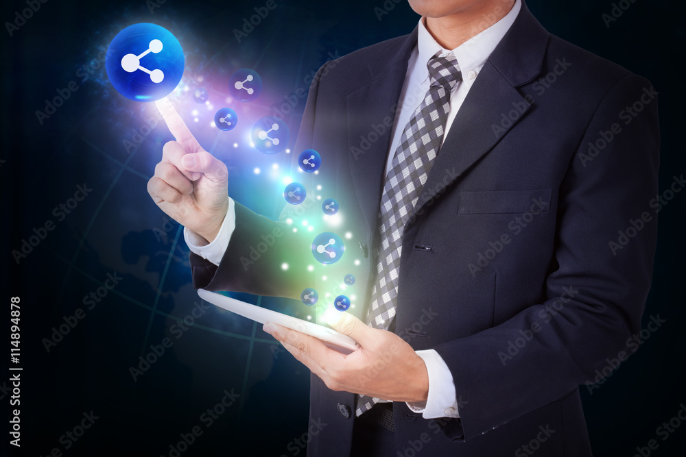 Businessman holding tablet with pressing database circular icon button. internet and technology concept Businessman holding tablet with pressing database circular icon button. internet and technology concept