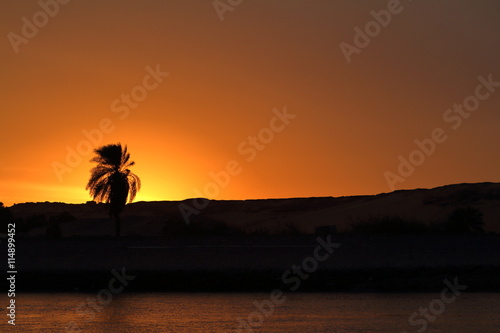 Sonnenuntergang mit Felucken auf dem Nil in Ägypten photo