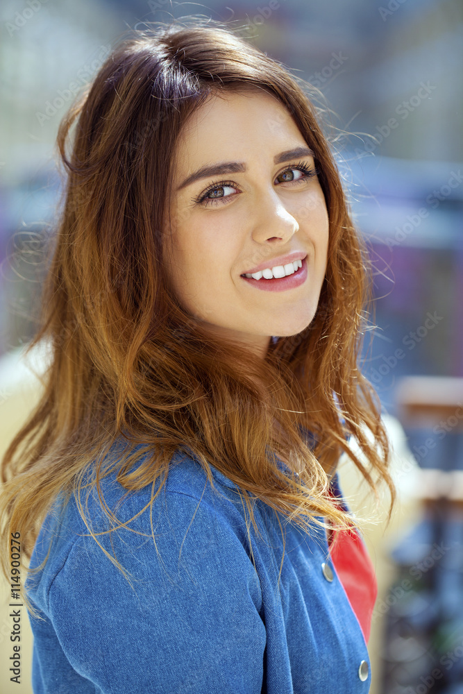 Fototapeta premium Portrait close up of young beautiful brunette girl