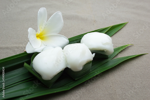 Ta-go Thai dessert  Pudding with coconut topping placed.