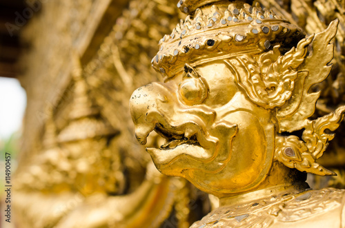Golden garuda decoration on wall of The Emerald Buddha temple or "Wat Phra Kaew", Bangkok, Thailand © enzozo