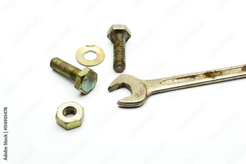 Old wrench, bolts, tools, equipment isolated on white background. Old wrench, bolts, tools, equipment isolated on white background.