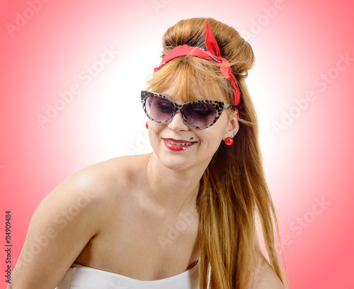 young woman in retro style with sunglasses