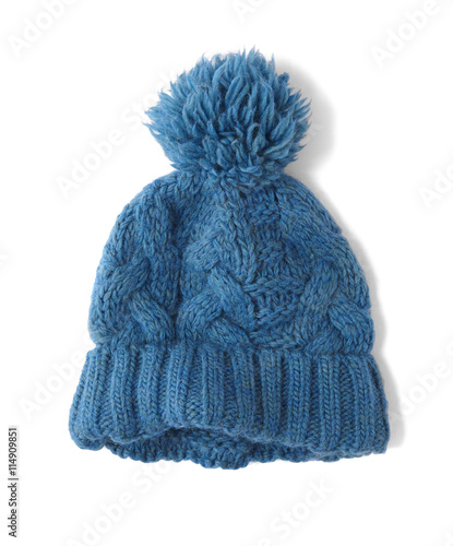 A knitted winter bobble hat isolated on a white background