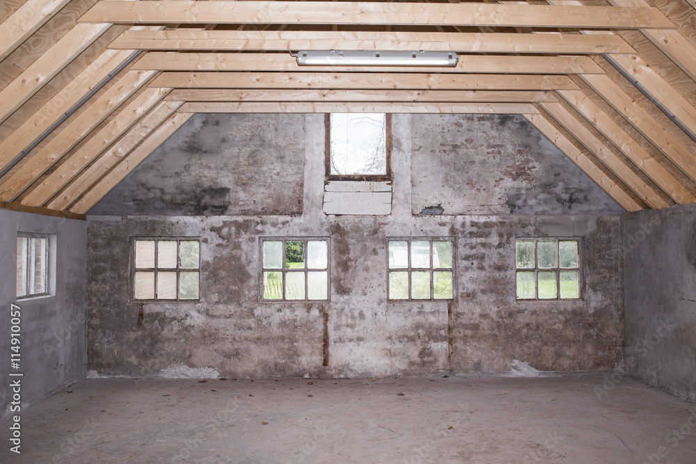 Empty interior of an old shed Empty interior of an old shed