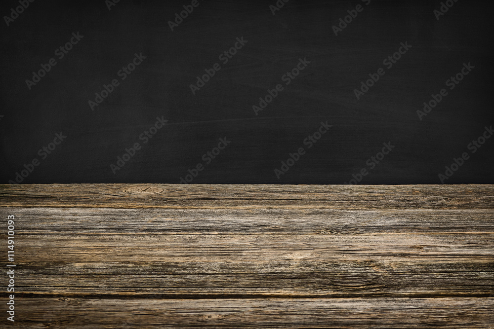 Black chalkboard texture with room for text or drawing Black chalkboard texture with room for text or drawing