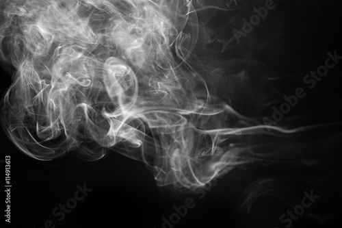 White smoke on a black background.