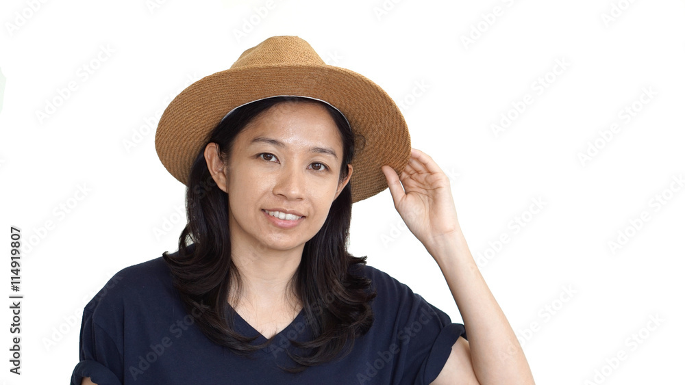 Casual friendly asian girl wearing hat relaxing and smiling on isolated background Casual friendly asian girl wearing hat relaxing and smiling on isolated background