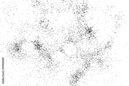 Abstract grainy texture isolated on white background. Silhouette of food flakes such as salt or almond or wheat flour spread on the flat surface or table. Top view. Dust, sand blow or bread crumbs.