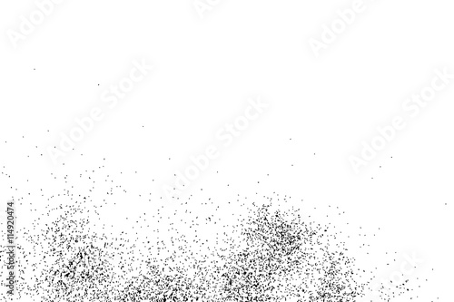 Abstract grainy texture isolated on white background. Silhouette of food flakes such as salt or almond or wheat flour spread on the flat surface or table. Top view. Dust, sand blow or bread crumbs.