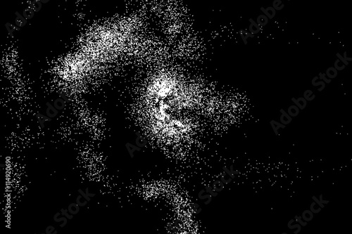 Abstract grainy texture isolated on black background. Silhouette of food flakes such as salt or almond or wheat flour spread on the flat surface or table. Top view. Dust, sand blow or bread crumbs.