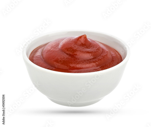 Bowl of tomato ketchup isolated on white background