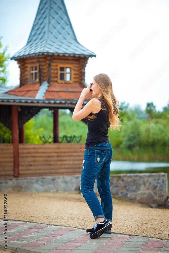 Young traveling woman in country